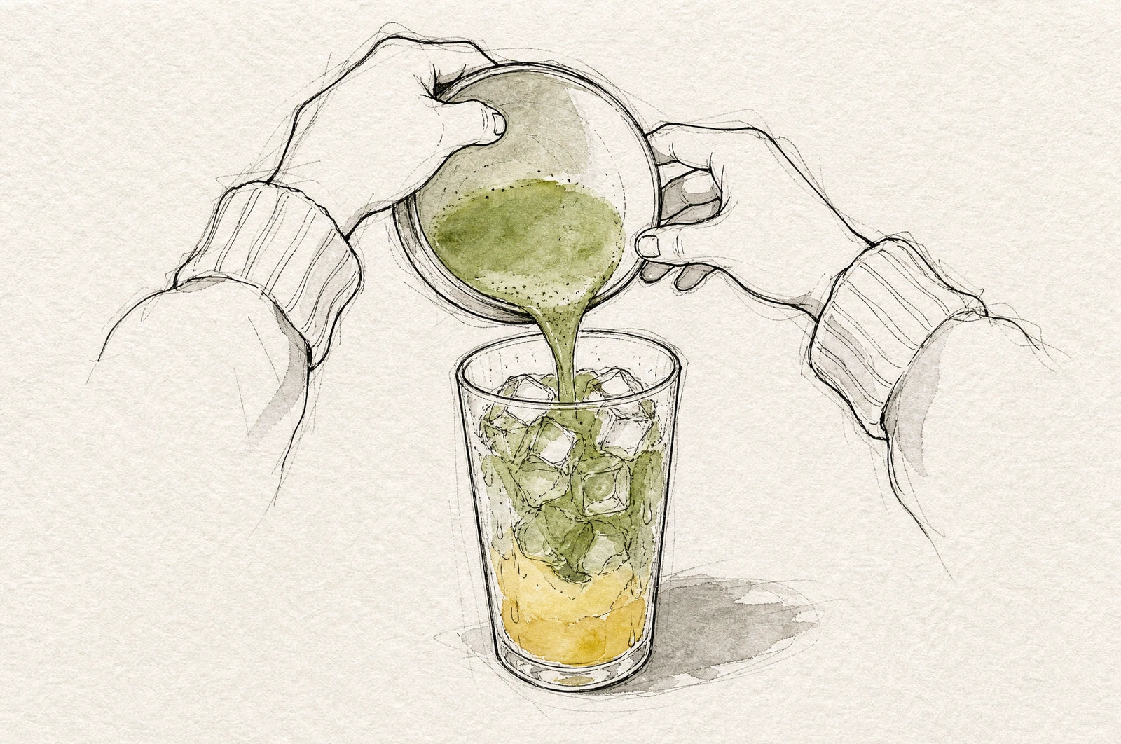 Matcha poured over ice and mango puree
